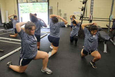 2018 fall girls soccer players weight room action photo